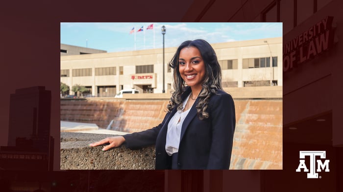 Danyelle Honoré poses in front of the law school building