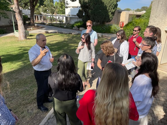 Mohammad Darawshe, Givat Haviva's Director of Planning, Equality and Shared Society, gives tour of campus to Texas A&M Law students